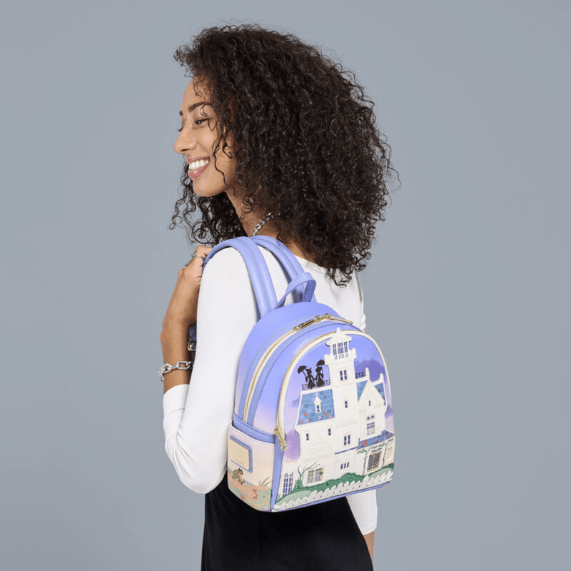 Model wearing the Loungefly Practical Magic 2 House Mini Backpack