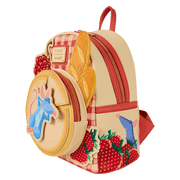 Loungefly Ratatouille Remy mini backpack with cheese wheel front pocket, baguette appliqué and strawberries, three-quarter angle