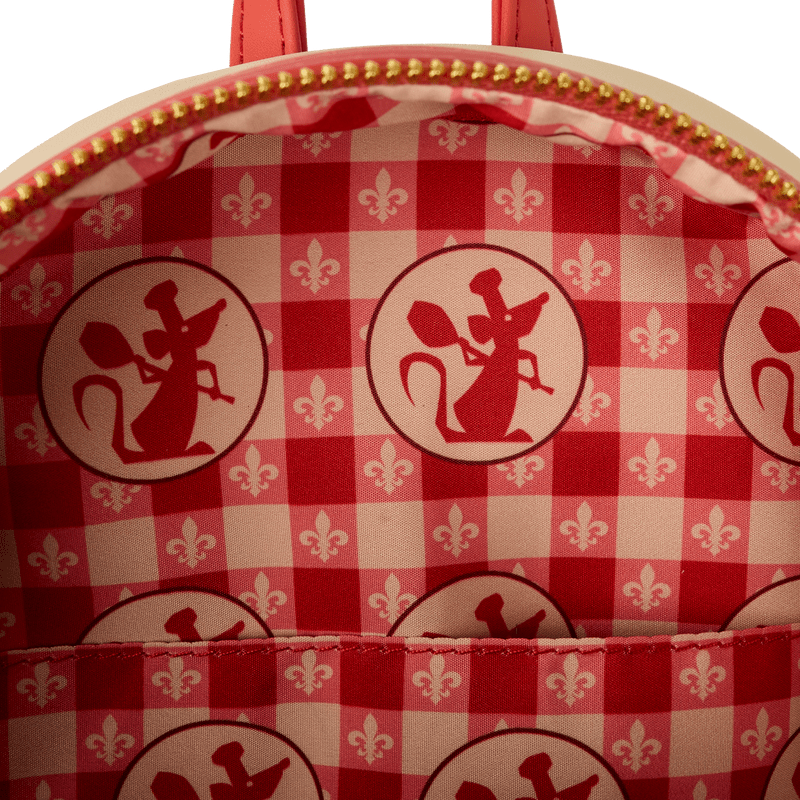 Close-up of red gingham interior lining with chef Remy icons inside the Loungefly Ratatouille mini backpack