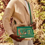 Loungefly Disney Robin Hood book-shaped bag worn crossbody