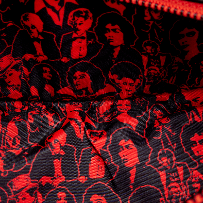 Close-up of red-and-black interior lining with Rocky Horror character print.