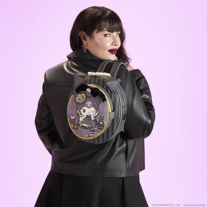 Model wearing Loungefly Kuromi Cameo mini backpack on back, showing round silhouette and ears.