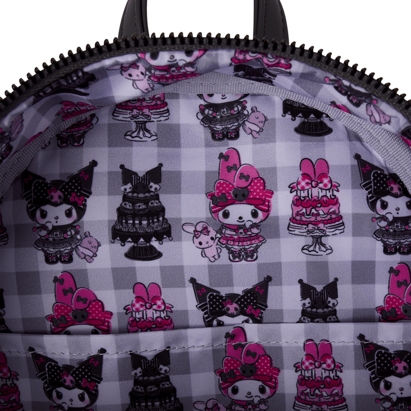 Close-up of grey gingham lining with My Melody, Kuromi and gothic cake print inside Loungefly bag
