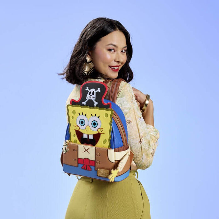 Model wearing Loungefly SpongeBob pirate mini backpack, showing the full character front and pirate hat design