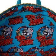 Interior close-up of Tom and Jerry logo print lining inside Loungefly mini backpack
