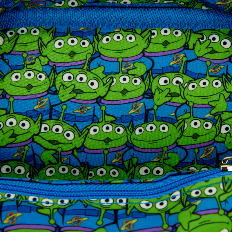 Interior lining with repeating Toy Story alien print inside crossbody