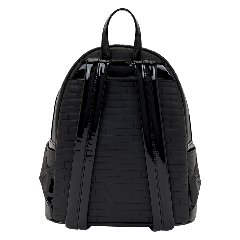 Back view of the Loungefly Universal Monsters Dracula mini backpack with black adjustable shoulder straps and brick-effect texture