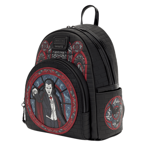 Side view of the Loungefly Universal Monsters Dracula Stained Glass Mini Backpack with black brick-effect body and red gothic artwork