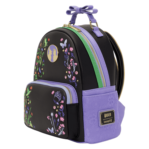 Angled front view of the Loungefly Wicked Floral and Lace Mini Backpack with green trim, lilac details and embroidered botanical artwork