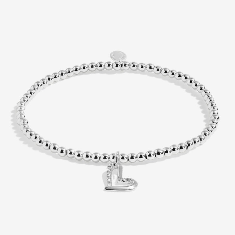 Full view of Joma Jewellery A Little Love You Mum Bracelet, silver-plated beaded stretch Bracelet with sparkly heart charm.