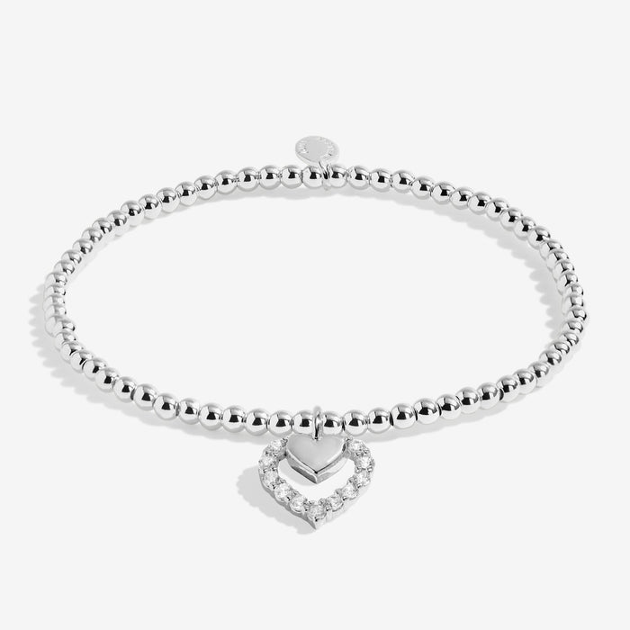 Full view of Joma Jewellery A Little Love You Mummy Bracelet, silver-plated beaded stretch Bracelet with crystal heart halo charm.