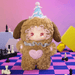 Sesame Choco plush – brown pup suit with blue party hat and pink heart‑paw pads, Flavor Twist series.
