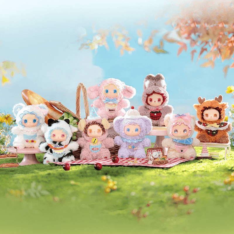 Full set of eight Pocket Zoo blind box collectables lined up on outdoor picnic table

