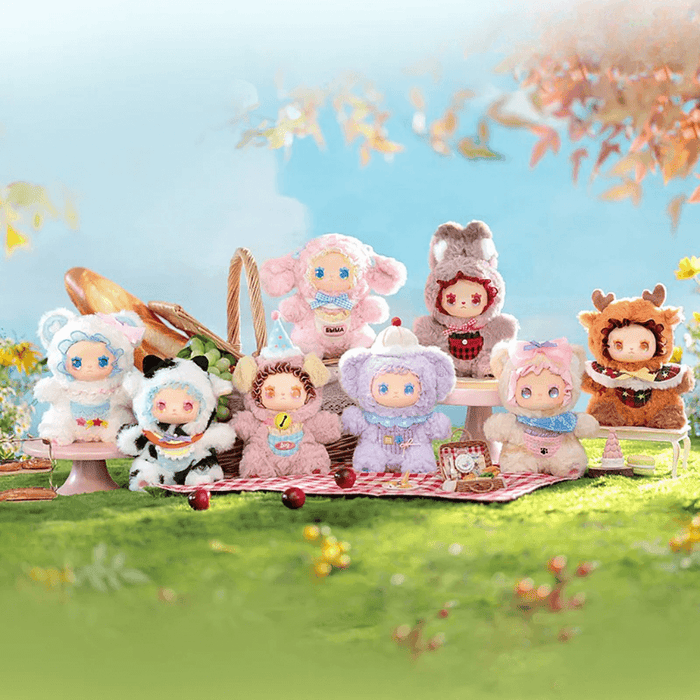 Full set of eight Pocket Zoo blind box collectables lined up on outdoor picnic table

