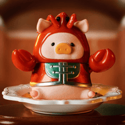 LuLu the Piggy dressed as a lobster bisque, sitting on a china plate – Pigchelin Restaurant Blind Box collectable

