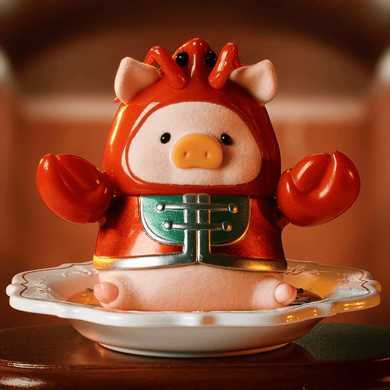 LuLu the Piggy dressed as a lobster bisque, sitting on a china plate – Pigchelin Restaurant Blind Box collectable
