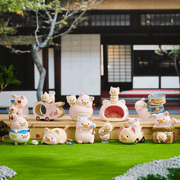 Outdoor group shot of all LuLu the Piggy Caturday Series Blind Box figures on grass scene

