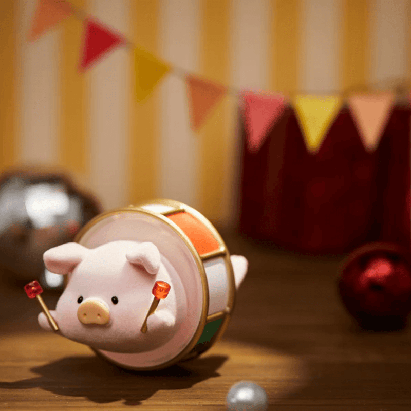 “Drummer” LuLu rolling inside orange-white bass drum with twin mallets – Blind Box collectable
