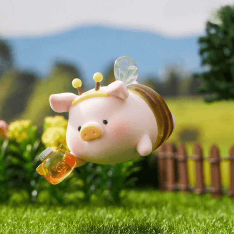 “Bee” LuLu in striped wingsuit flying with jar of honey – Farm Garden Blind Box figure
