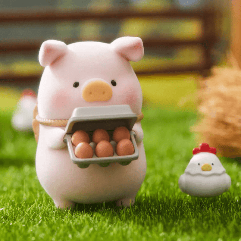 “Chicken Farmer” LuLu carrying a dozen eggs with chick in background – Farm Garden Blind Box
