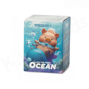 Front view of LuLu the Piggy Ocean Blind Box showing Whale Balloon artwork against aqua-blue background
