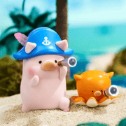 “Captain” LuLu wearing blue anchor hat, scanning horizon with telescope beside orange crab first-mate – Ocean Blind Box figure
