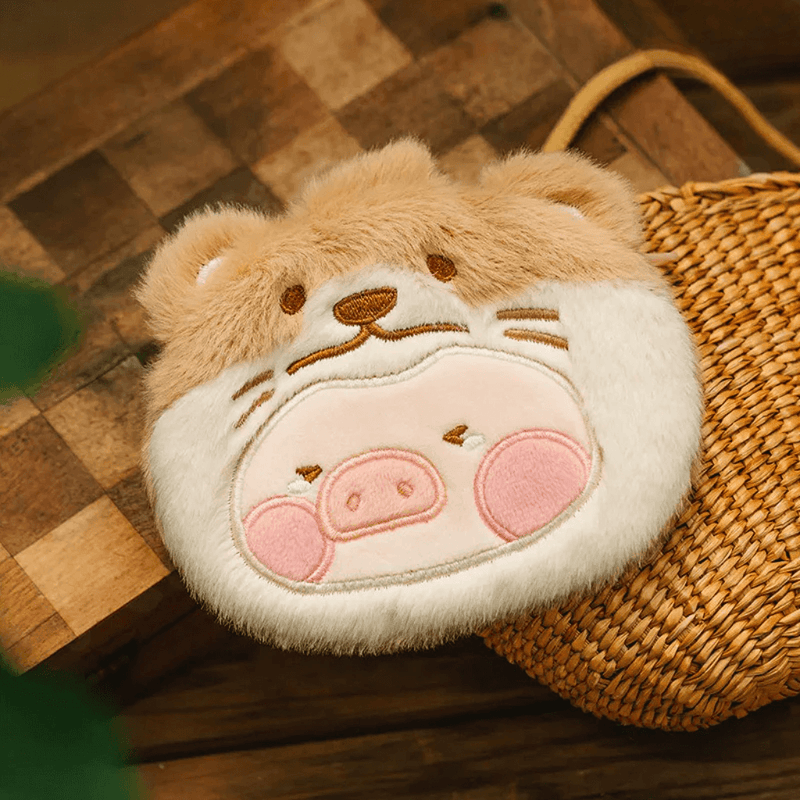 Hidden Sobbing Otter Lu plush pouch with fluffy otter hood and embroidered tears on wooden table.
