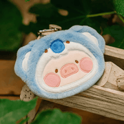 Koala Lu plush pouch in sky-blue fur; metal key clip visible behind the ears.

