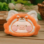 Red Panda Lu plush pouch, bright orange faux fur with white markings, posed among greenery.
