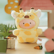 Lulu the Piggy Acrophobia Giraffe hidden blind box keyring—yellow giraffe costume with tiny carrot prop on desk.









