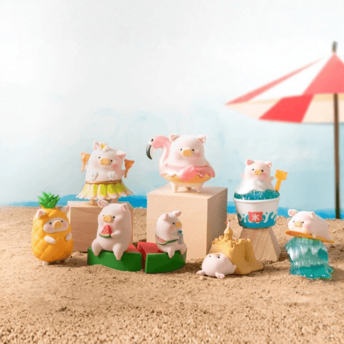 LuLu the Piggy Beach Party Blind Box Series group display arranged on sand with beach umbrella backdrop
