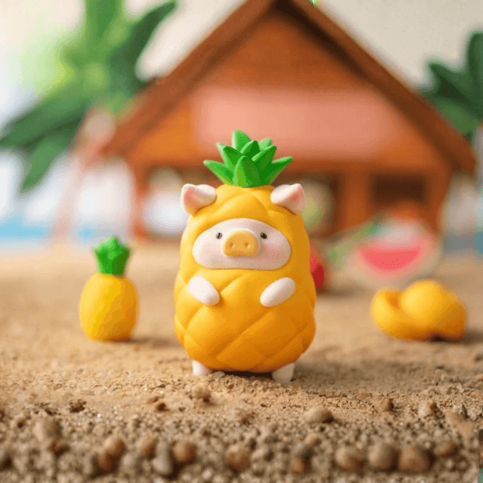 LuLu the Piggy Beach Party Blind Box Series Pineapple figure dressed in a pineapple costume on the sand