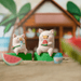 LuLu the Piggy Beach Party Blind Box Series display with Watermelon and Watermelon Soda figures in front of a beach hut