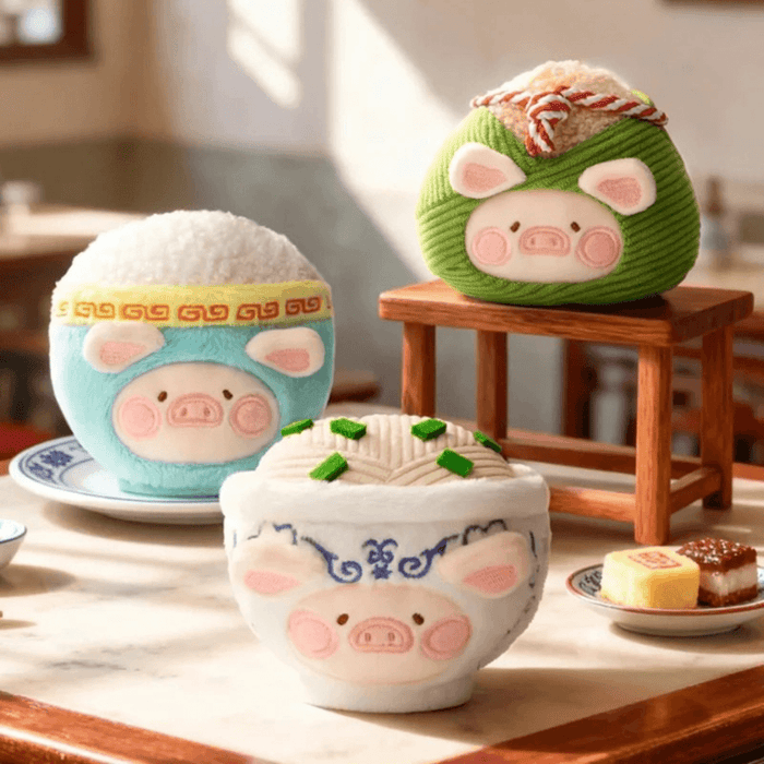 LuLu the Piggy Big Bowl Noodles plush keychain lifestyle image with other Food Hunter designs
