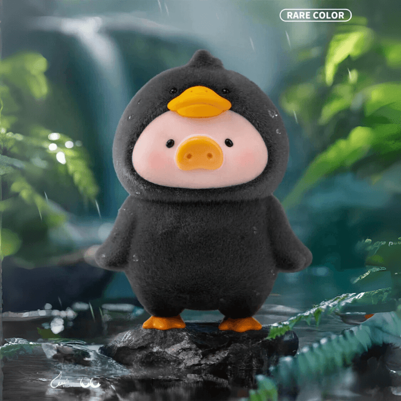 Lulu the Piggy Animal Party Rare-Colour Black Duck blind box figure standing on a rain-soaked rock by misty waterfall.









