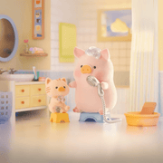 Lulu the Piggy Home Life blind box “Bath Time” figure showering a tiny cat friend in a pastel bathroom scene.
