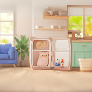 Lulu the Piggy Home Life blind box “Fridge Hideout” figure set—pig relaxing inside a pink bear-eared mini fridge stocked with treats.
