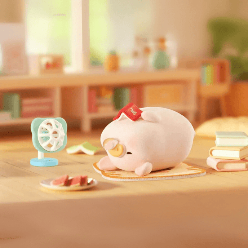 Lulu the Piggy Home Life blind box “Heatwave Nap” figure—pig sprawled under a mini fan with watermelon snack on a summer day.
