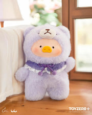 Lulu the Piggy Joyful Time blind box plush in lavender teddy suit, ruffled purple bow, leaning by a cosy sofa.
