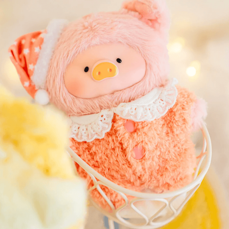 Lulu the Piggy Charismatic plush keychain in warm orange sleep outfit with lace collar
