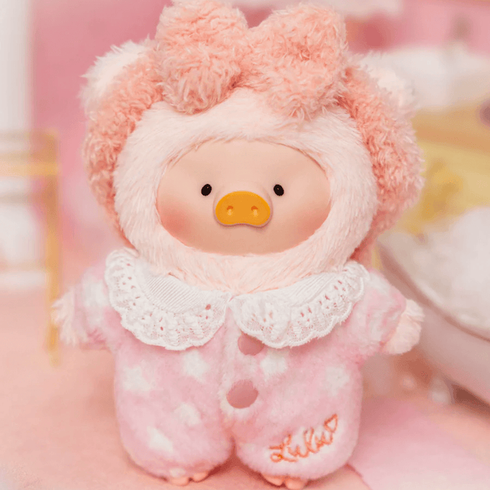Lulu the Piggy super hidden Radiant plush keychain in soft pink sleep outfit with fluffy hood