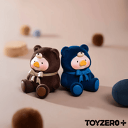 Flocked Lulu The Piggy mini blind box toys in brown and navy teddy suits

