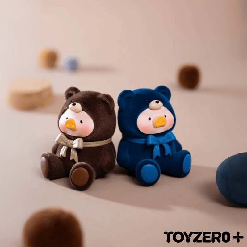 Flocked Lulu The Piggy mini blind box toys in brown and navy teddy suits

