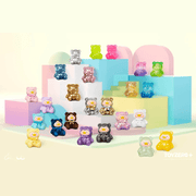 Full collection display of Lulu The Piggy Teddy Mini figures arranged on pastel podium