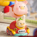 Lulu The Piggy Lululand Series Blind Box Balloon Parade figure riding a colourful parade car with balloon detail