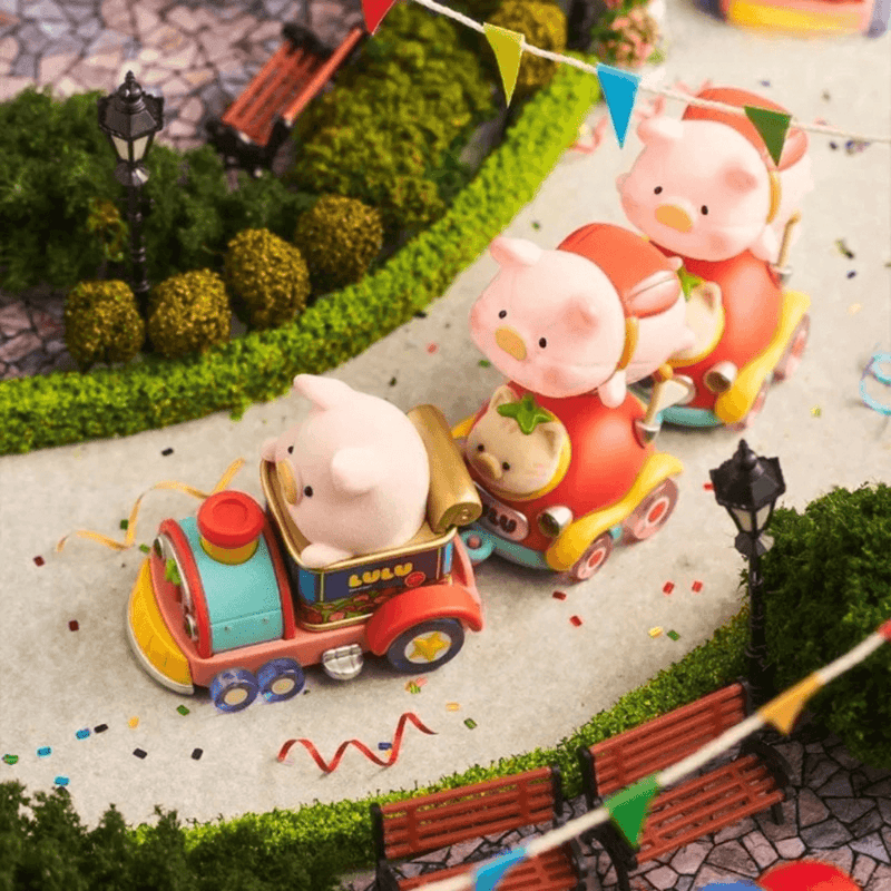 Lulu The Piggy Lululand Series Blind Box fairground train scene with LuLu figures riding a colourful miniature train