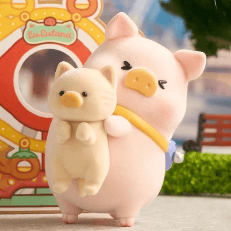 Lulu The Piggy Lululand Series Blind Box Selfie Wheel figure posing with a small cat character beside a fairground sign