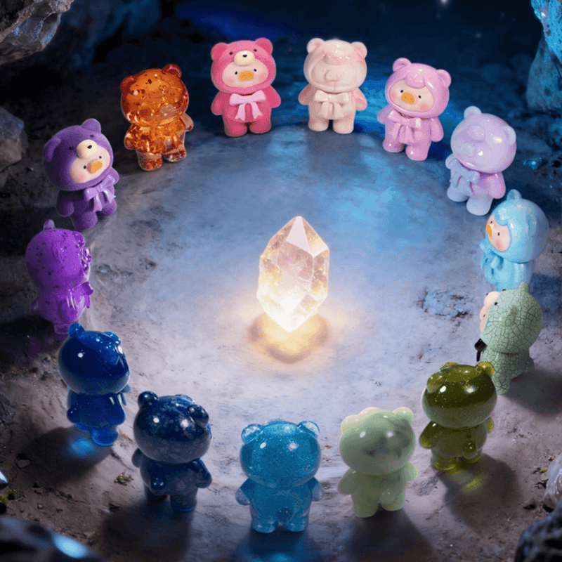 Lulu the Piggy Teddy Mini 2 Ore Collection figures arranged around a glowing crystal