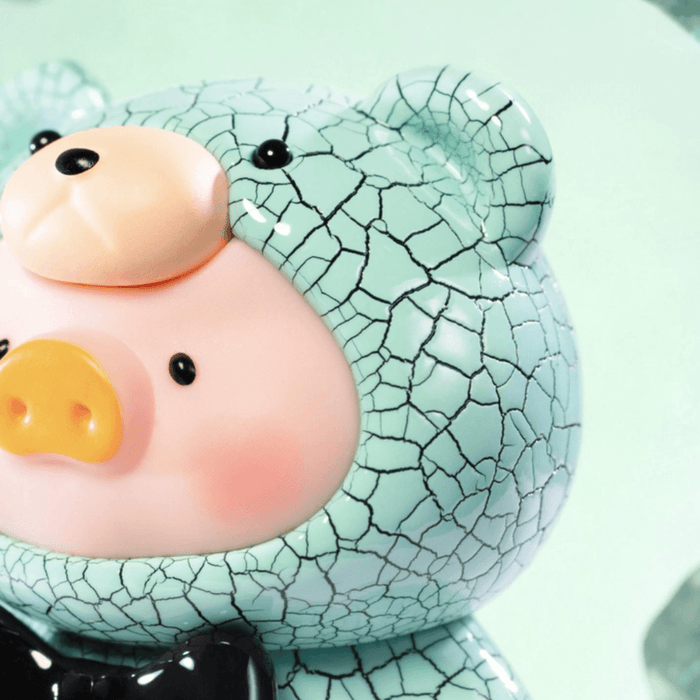 Close-up of Lulu the Piggy Teddy Mini 2 Ore Collection cracked turquoise style figure