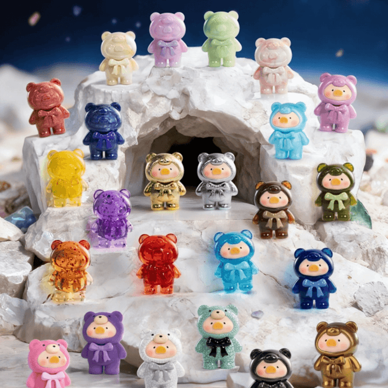 Lulu the Piggy Teddy Mini 2 Ore Collection full blind bag figure range on crystal display